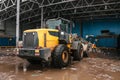 Special machinery or bulldozer work on the site of waste unloading at the plant for waste disposal.