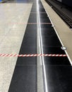Special markings to observe social distance on the railway platform. Concept of safe travels, social distancing, new normal