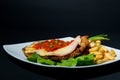 Special meal with french fries, salad and a schnitzel Royalty Free Stock Photo