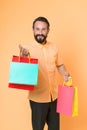 Special offer. Bearded man shopping bags seasonal sale. Hipster buying sale price. Black Friday. Cyber monday sale. Nice Royalty Free Stock Photo