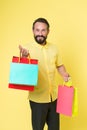 Special offer. Bearded man shopping bags seasonal sale. Hipster buying sale price. Black Friday. Cyber monday sale. Nice Royalty Free Stock Photo