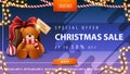 Special offer, Christmas sale, up to 50% off, horizontal blue discount banner with garlands, button and Teddy bear with present Royalty Free Stock Photo