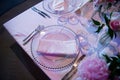 Special plate and some glasses from a wedding in a fantastic atmosphere. Formal, marriage. Royalty Free Stock Photo