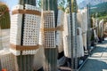 Special protective styrofoam cases with holes for packing and transportation of biggest cactuses for garden landscaping
