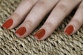 Special red nail lack with shinning parts on one finger