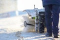 Special snow machine clears snow on the city street Royalty Free Stock Photo