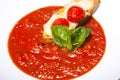 Special soup plate made by a restaurant chef with tomatoes shot on a white background