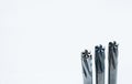 Special tools isolated on white background. Solid carbide end mill cutting tools by CNC milling cutter. Coated step drill. Royalty Free Stock Photo