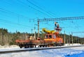 Special train with a landing crane for service and repair of electrical networks on the railway
