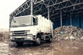 A special truck unloads waste. Transportation of waste. Technological process. Recycling and storage of waste for