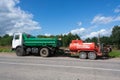 Special vehicles of the road service are parked on the side of the road. Road works. Kuvshinovo  Tver oblast. Royalty Free Stock Photo