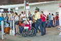 Special wheel chair assistance helps handicapped people to avoid long queues