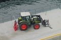 Hellesylt, Norway - Jul 09, 2018: Special wheel tractor on concrete mooring
