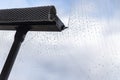 A special window cleaner cleans the foamy liquid from the glass surface Royalty Free Stock Photo