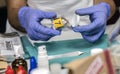 Specialist cop examines hair from crime scene