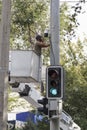Specialists are engaged in setting up security cameras at the intersection