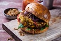 Speciality gourmet fried mealworm insect burger Royalty Free Stock Photo