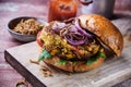 Speciality insect burger with fried mealworms Royalty Free Stock Photo