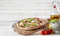 Speciality oven-fired prosciutto Italian pizza