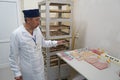 Almaty, Kazakhstan - 04.08.2021 : A virologist examines containers with a culture medium for viruses