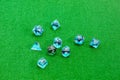 Specialized polyhedral dice for role-playing games on green clot Royalty Free Stock Photo