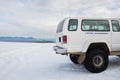 Specially modified Ford minibus on Vatnajokull glacier in Iceland