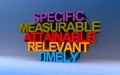 specific measurable attainable relevant timely on blue Royalty Free Stock Photo