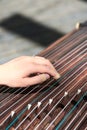 A specific scene when fingers play the guzheng Royalty Free Stock Photo