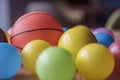 A specific shot of a pile of colorful plastic toy balls