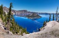 This specifiic Crater Lake blue. Wizard island in the blue water of the Crater Lake