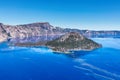 This specifiic Crater Lake blue. Wizard island in the blue water of the Crater Lake Royalty Free Stock Photo
