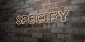 SPECIFY - Glowing Neon Sign on stonework wall - 3D rendered royalty free stock illustration