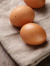 Speckled chicken eggs on sack Royalty Free Stock Photo