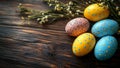Speckled Easter Eggs with Floral Branches on Rustic Wooden Background Royalty Free Stock Photo