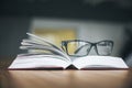 Specs and open book Royalty Free Stock Photo