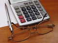 Spectacles and calculator Royalty Free Stock Photo