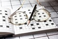 Spectacles, pencil, crossword Royalty Free Stock Photo