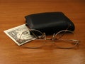 Spectacles and wallet Royalty Free Stock Photo
