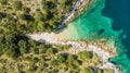 Spectacular aerial sea landscape of rocky coast and crystal clear water. Royalty Free Stock Photo