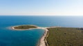 Spectacular aerial sea landscape of rocky coast and crystal clear water. Royalty Free Stock Photo