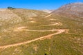 Drone photography from the winding country road to the top of Attavyros Mountain. Rhodes Island, Greece. Royalty Free Stock Photo