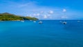 Spectacular aerial view of some yachts and small boats floating on a clear and turquoise sea, Seychelles in the Indian Ocean.Top Royalty Free Stock Photo