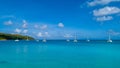 Spectacular aerial view of some yachts and small boats floating on a clear and turquoise sea, Seychelles in the Indian Ocean.Top Royalty Free Stock Photo