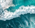 Spectacular aerial view of a surfer taking on waves in a blue ocean Royalty Free Stock Photo