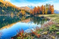 Spectacular autumn view of Champfer lake
