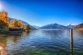 Spectacular autumn view of lake meadows trees and mountains in Sell Am See