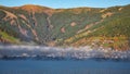 Spectacular autumn view of lake meadows trees and mountains in Sell Am See