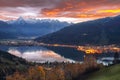 Spectacular autumn view of lake meadows trees and mountains in Sell Am See