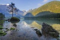 Spectacular, beautiful sunrise over Lake Laghi di Fusine