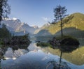 Spectacular, beautiful sunrise over Lake Laghi di Fusine